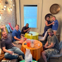 Settle into comfort at Porterdale Mill Lofts a group of people at a party